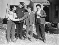 James Finlayson, Tiny Sandford, Stan Laurel, Oliver Hardy
