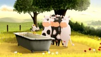Quatre vaches découvrent la liberté dans le monde inconnu qui s’étend au-delà de leur pré.